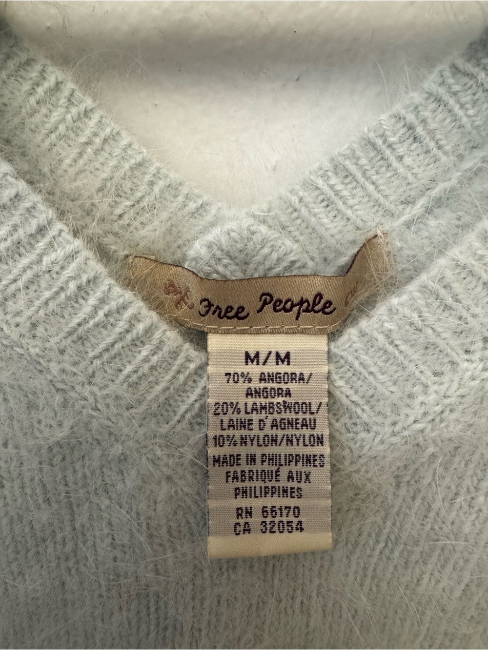 Free People V-Neck Fluffy Sweater in Light Blue. small stain. S-XS - Picture 2 of 3